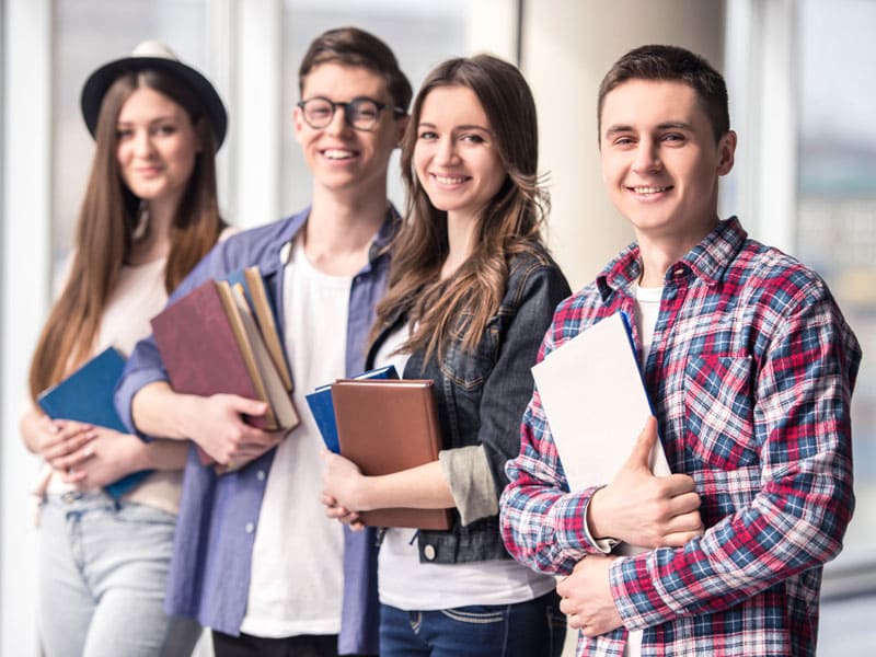 group-happy-young-students study abroad education consultants in dubai